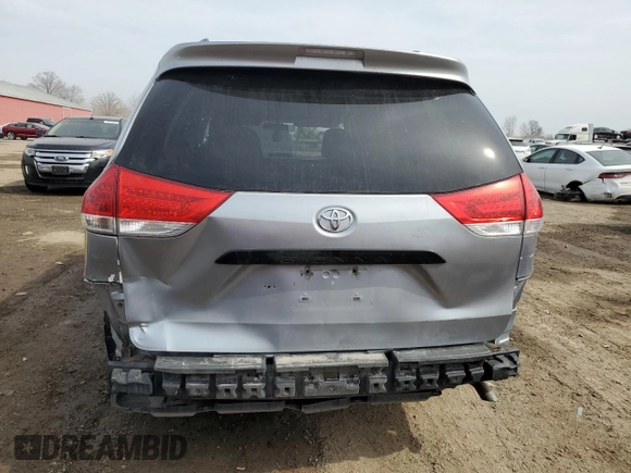 2014 Toyota Sienna L with VIN 5TDZK3DC7ES489962, listed as a Copart auction lot 48117985 with 329,366 mi miles and Clean Title. Bid and sale history available at carsss.com. Image 6.