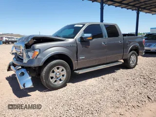 2012 Ford F-150 XL with VIN 1FTFW1ET4CKD78574, listed as a Copart auction lot 62600615 with 126,985 mi miles and Salvage title. Bid and sale history available at DreamBid. Image 1.