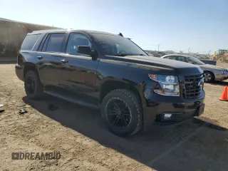 2019 Chevrolet Tahoe Premier with VIN 1GNSKCKJ4KR406220, listed as a Copart auction lot 50491344 with 37,254 mi miles and Salvage title. Bid and sale history available at DreamBid. Image 4.