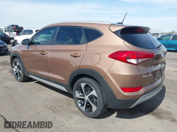 2017 Hyundai Tucson Value z VIN KM8J33A21HU495872, wystawiony jako IAAI lot #42235210 z przebiegiem 158 185 mil mil oraz . Historia ofert i sprzedaży dostępna na DreamBid. Obrazek 3.