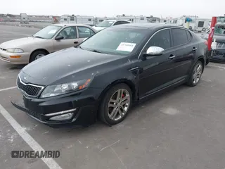 2013 Kia Optima SX with VIN 5XXGR4A63DG141938, listed as a IAAI auction lot 41760964 with 77,241 mi miles and . Bid and sale history available at DreamBid. Image 2.