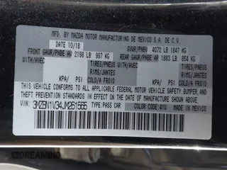 2018 Mazda 3 Touring with VIN 3MZBN1V34JM261565, listed as a IAAI auction lot 41795238 with 121,112 mi miles. Bid and sale history available at carsss.com. Image 9.