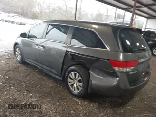 2014 Honda Odyssey EX-L with VIN 5FNRL5H6XEB060090, listed as a IAAI auction lot 41625571 with 112,762 mi miles and . Bid and sale history available at carsss.com. Image 3.