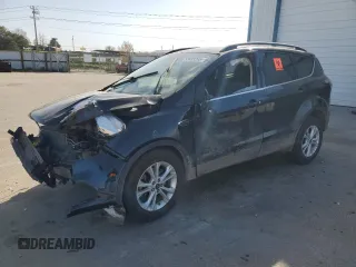 2017 Ford Escape SE z VIN 1FMCU9G9XHUC10941, wystawiony jako Copart lot #53489265 z przebiegiem Nie podano mil oraz Szkoda całkowita • Salvage title. Historia ofert i sprzedaży dostępna na DreamBid. Obrazek 1.
