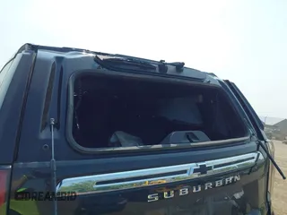 2021 Chevrolet Suburban LS z VIN 1GNSKBKD5MR303640, wystawiony jako IAAI lot #42359585 z przebiegiem Nie podano mil oraz . Historia ofert i sprzedaży dostępna na DreamBid. Obrazek 19.