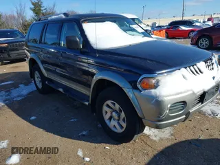 2004 Mitsubishi Montero Sport XLS with VIN JA4MT31R34J008532, listed as a IAAI auction lot 41588402 with 113,546 mi miles. Bid and sale history available at carsss.com. Image 1.