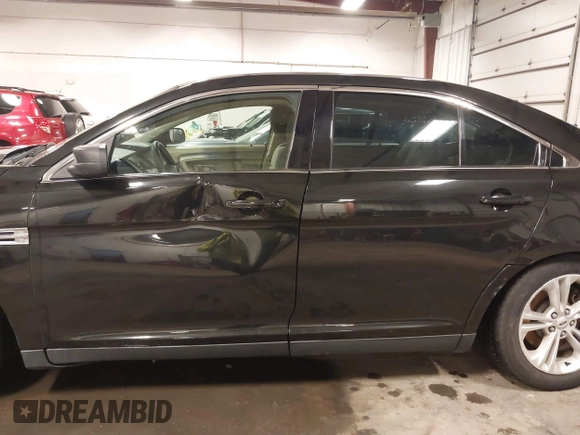 2015 Ford Taurus SE with VIN 1FAHP2D81FG159514, listed as a IAAI auction lot 41641336 with 110,137 mi miles and . Bid and sale history available at carsss.com. Image 15.