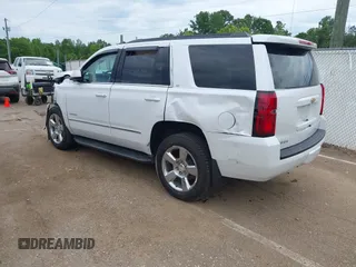 2020 Chevrolet Tahoe LT with VIN 1GNSCBKC4LR181887, listed as a IAAI auction lot 42160821 with 106,757 mi miles and . Bid and sale history available at DreamBid. Image 3.