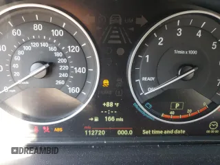 2012 BMW 3 Series 328i with VIN WBA3A5C58CF348710, listed as a Copart auction lot 61266815 with 112,720 mi miles and Salvage title. Bid and sale history available at DreamBid. Image 9.