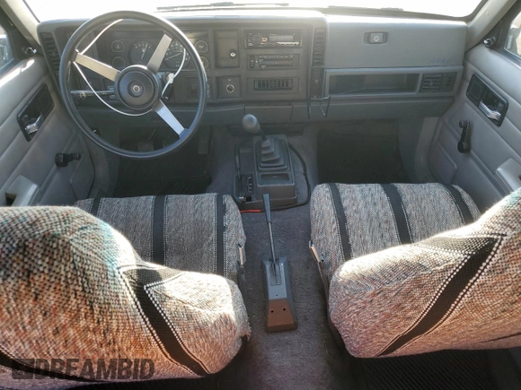 1993 Jeep Cherokee SE with VIN 1J4FJ28S0PL594889, listed as a Copart auction lot 50103425 with 174,333 mi miles and Salvage Title. Bid and sale history available at carsss.com. Image 8.