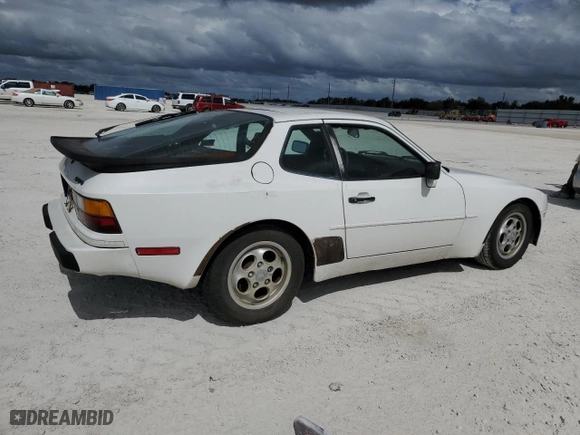1986 Porsche 944 with VIN WP0AA0948GN453769, listed as a Copart auction lot 76462054 with 264,439 mi miles and Salvage Title. Bid and sale history available at carsss.com. Image 3.