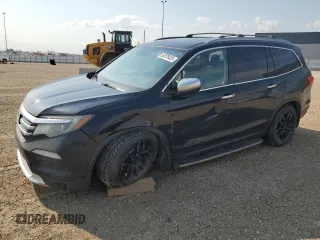 2016 Honda Pilot Touring with VIN 5FNYF6H94GB508149, listed as a Copart auction lot 58976425 with 376,509 mi miles and Salvage title. Bid and sale history available at DreamBid. Image 1.