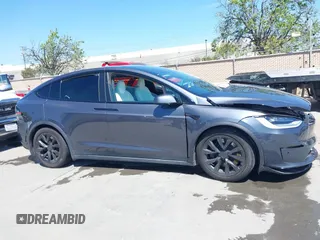 2022 Tesla Model X with VIN 7SAXCAE59NF360301, listed as a IAAI auction lot 41945059 with Not Provided miles and . Bid and sale history available at DreamBid. Image 13.