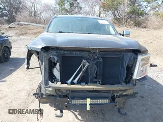 2016 Nissan Titan XD Platinum Reserve with VIN 1N6BA1F27GN506410, listed as a IAAI auction lot 41768621 with 159,404 mi miles. Bid and sale history available at carsss.com. Image 13.