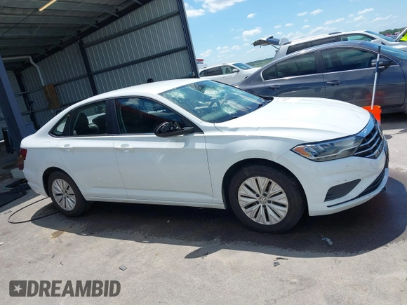 2019 Volkswagen Jetta S z VIN 3VWC57BU7KM200586, wystawiony jako IAAI lot #42609606 z przebiegiem 72 874 mil mil oraz . Historia ofert i sprzedaży dostępna na DreamBid. Obrazek 13.