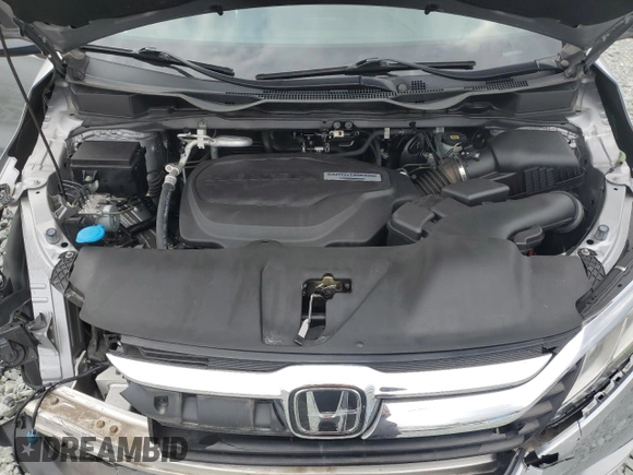 2019 Honda Odyssey EX-L with VIN 5FNRL6H72KB036411, listed as a Copart auction lot 43277355 with 76,244 mi miles and Salvage Title. Bid and sale history available at DreamBid. Image 14.