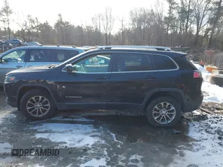 2019 Jeep Cherokee Altitude with VIN 1C4PJMLB0KD319703, listed as a IAAI auction lot 41524781 with 181,625 mi miles and . Bid and sale history available at DreamBid. Image 14.