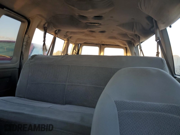 2006 Ford Econoline Passenger XL with VIN 1FBSS31L66DA77295, listed as a Copart auction lot 77022084 with 279,140 mi miles and Salvage Title. Bid and sale history available at carsss.com. Image 10.