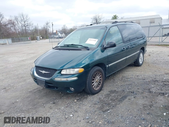 1999 Chrysler Town & Country with VIN 1C4GP54G6XB603564, listed as a IAAI auction lot 41823340 with 104,321 mi miles and . Bid and sale history available at DreamBid. Image 18.