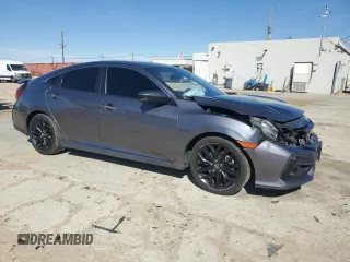 2020 Honda Civic Si with VIN 2HGFC1E57LH702572, listed as a Copart auction lot 50269585 with 126,077 mi miles and Salvage Title. Bid and sale history available at DreamBid. Image 4.
