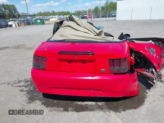 2003 Ford Mustang Deluxe z VIN 1FAFP44453F358762, wystawiony jako IAAI lot #42038789 z przebiegiem Nie podano mil oraz . Historia ofert i sprzedaży dostępna na DreamBid. Obrazek 16.