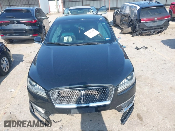 2018 Lincoln MKZ Select z VIN 3LN6L5C90JR625598, wystawiony jako IAAI lot #42189498 z przebiegiem 98 803 mil mil oraz . Historia ofert i sprzedaży dostępna na DreamBid. Obrazek 11.