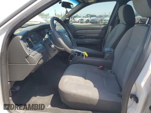 2011 Ford Police Interceptor with VIN 2FABP7BV4BX167977, listed as a Copart auction lot 61819025 with 104,769 mi miles and Salvage title. Bid and sale history available at DreamBid. Image 7.