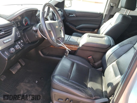 2017 Chevrolet Suburban Premier with VIN 1GNSKJKC4HR316953, listed as a Copart auction lot 76944884 with 105,753 mi miles and Salvage Title. Bid and sale history available at DreamBid. Image 7.