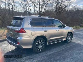 2020 Lexus LX with VIN JTJDY7AX7L4332820, listed as a Copart auction lot 85960234 with 102,384 mi miles and Clean Title. Bid and sale history available at carsss.com. Image 4.