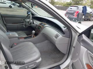 2001 Toyota Avalon XL with VIN 4T1BF28B11U183312, listed as a IAAI auction lot 42185284 with 319,027 mi miles and . Bid and sale history available at DreamBid. Image 5.
