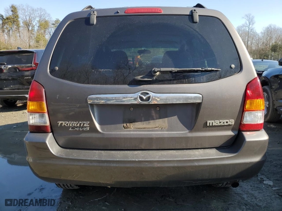 2003 Mazda Tribute LX with VIN 4F2YZ94123KM06595, listed as a Copart auction lot 44111665 with 0 mi miles and Salvage Title. Bid and sale history available at carsss.com. Image 6.