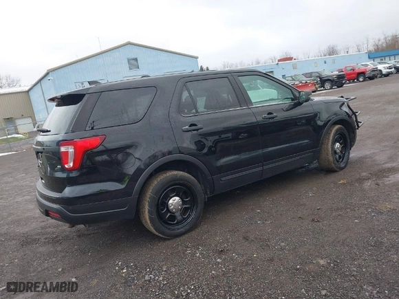 2019 Ford Police Interceptor Utility with VIN 1FM5K8AR8KGB23661, listed as a IAAI auction lot 41745072 with 199,251 mi miles. Bid and sale history available at carsss.com. Image 4.