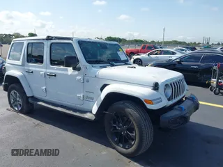 2024 Jeep Wrangler Sahara with VIN 1C4RJXP66RW188508, listed as a IAAI auction lot 42263893 with 24,458 mi miles and . Bid and sale history available at DreamBid. Image 1.