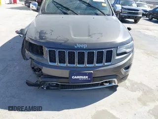 2015 Jeep Grand Cherokee Overland with VIN 1C4RJECT2FC648292, listed as a IAAI auction lot 41806402 with 116,766 mi miles. Bid and sale history available at carsss.com. Image 6.