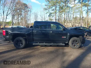 2015 Chevrolet Silverado 1500 LTZ with VIN 3GCUKSEC0FG497341, listed as a IAAI auction lot 41829608 with 96,805 mi miles. Bid and sale history available at carsss.com. Image 13.
