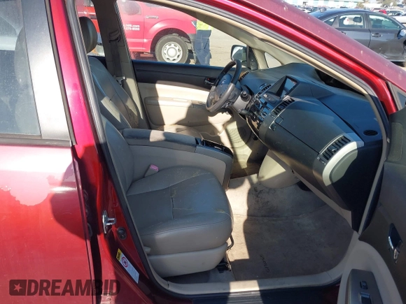 2005 Toyota Prius with VIN JTDKB20U657006529, listed as a IAAI auction lot 41869887 with 136,323 mi miles. Bid and sale history available at carsss.com. Image 5.