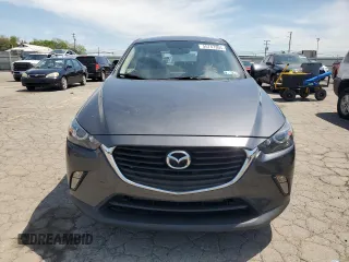 2017 Mazda CX-3 Touring z VIN JM1DKFC76H0149368, wystawiony jako Copart lot #55747305 z przebiegiem 47 946 mil mil oraz Szkoda całkowita • Salvage title. Historia ofert i sprzedaży dostępna na DreamBid. Obrazek 5.