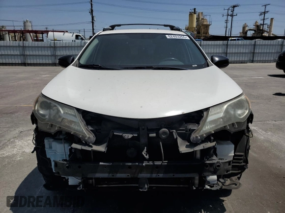 2014 Toyota RAV4 LE with VIN JTMZFREV4EJ006299, listed as a Copart auction lot 62403265 with 130,215 mi miles and Salvage title. Bid and sale history available at DreamBid. Image 5.