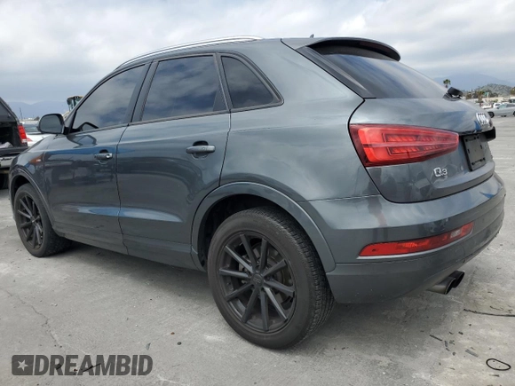 2018 Audi Q3 Premium with VIN WA1ECCFS8JR002738, listed as a Copart auction lot 53276095 with 171,912 mi miles and Salvage title. Bid and sale history available at DreamBid. Image 2.