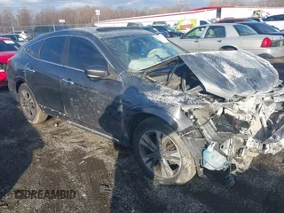 2013 Honda Crosstour EX-L z VIN 5J6TF1H53DL002566, wystawiony jako IAAI lot #40997717 z przebiegiem 214 518 mil mil oraz . Historia ofert i sprzedaży dostępna na DreamBid. Obrazek 1.