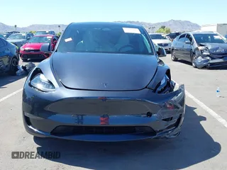 2024 Tesla Model Y Long Range z VIN 7SAYGDEE0RF128802, wystawiony jako IAAI lot #42128685 z przebiegiem 15 713 mil mil oraz . Historia ofert i sprzedaży dostępna na DreamBid. Obrazek 11.