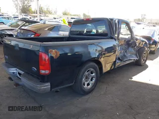 2002 Ford F-150 XL with VIN 1FTRX17WX2NB99454, listed as a IAAI auction lot 41643850 with 180,149 mi miles. Bid and sale history available at carsss.com. Image 4.