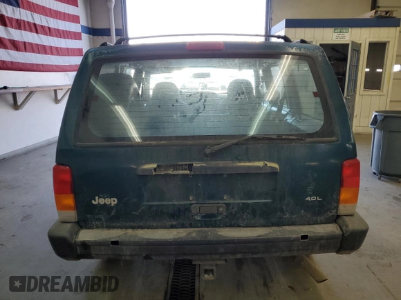 1997 Jeep Cherokee SE with VIN 1J4FJ28S1VL582070, listed as a Copart auction lot 43194435 with 192,534 mi miles and Salvage Title. Bid and sale history available at carsss.com. Image 6.