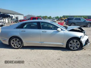 2014 Lincoln MKZ Hybrid with VIN 3LN6L2LU5ER822663, listed as a IAAI auction lot 42656735 with 122,025 mi miles and . Bid and sale history available at DreamBid. Image 13.