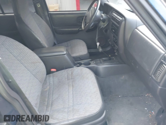 2001 Jeep Cherokee Sport with VIN 1J4FT48S71L525856, listed as a IAAI auction lot 42349383 with 218,122 mi miles and . Bid and sale history available at DreamBid. Image 5.