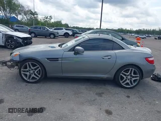 2015 Mercedes-Benz SLK 250 z VIN WDDPK4HA2FF099896, wystawiony jako IAAI lot #42333660 z przebiegiem 58 892 mil mil oraz . Historia ofert i sprzedaży dostępna na DreamBid. Obrazek 14.