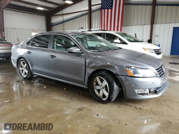 2012 Volkswagen Passat SE with VIN 1VWBH7A39CC102416, listed as a Copart auction lot 61557405 with 170,034 mi miles and Salvage title. Bid and sale history available at DreamBid. Image 4.