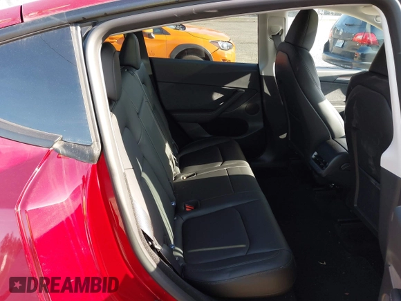 2024 Tesla Model Y Long Range with VIN 7SAYGDEE9RF199805, listed as a IAAI auction lot 42018221 with 7,359 mi miles. Bid and sale history available at carsss.com. Image 8.