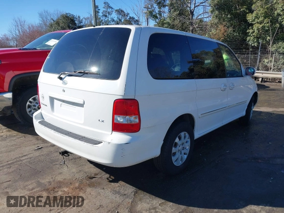 2005 Kia Sedona LX with VIN KNDUP132956703200, listed as a IAAI auction lot 41700159 with 125,578 mi miles. Bid and sale history available at carsss.com. Image 4.
