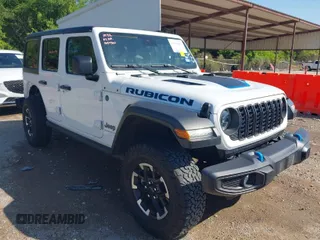 2024 Jeep Wrangler Rubicon with VIN 1C4RJXR67RW241049, listed as a IAAI auction lot 41978691 with 23,808 mi miles and . Bid and sale history available at DreamBid. Image 1.